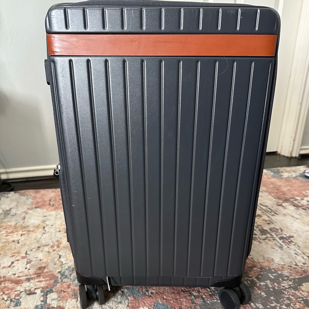 Carl Friedrik Black and Brown Suitcase